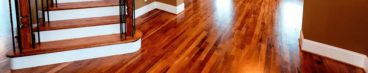 Base floor of a staircase with professionally restored wood flooring in Wichita KS