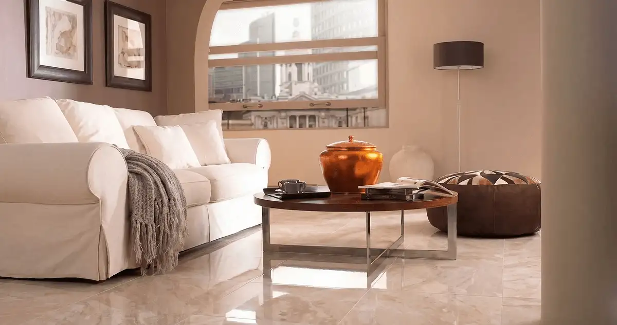 Modern living room with professionally installed marble flooring, a beige sofa, coffee table in Wichita, KS