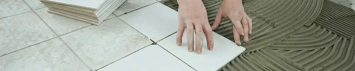 Professional installing white tile floors in Wichita, KS